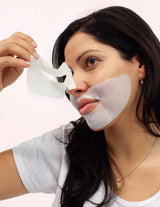 The Wild flower Yae Bio Collagen Face Mask being applied by a woman for deep hydration and firming