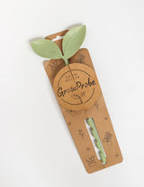 The Wild flower GrowProbe sage green leaf-shaped plant soil moisture indicator tool on branded cardboard packaging.