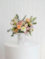 The Wild flower Luxury Pastel Perfection bouquet of mixed pastel roses and eucalyptus in a white hat box