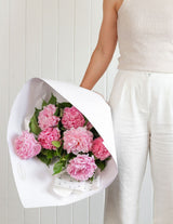 The Wild Flower Peonies Bouquet: fluffy pink peonies wrapped in white paper